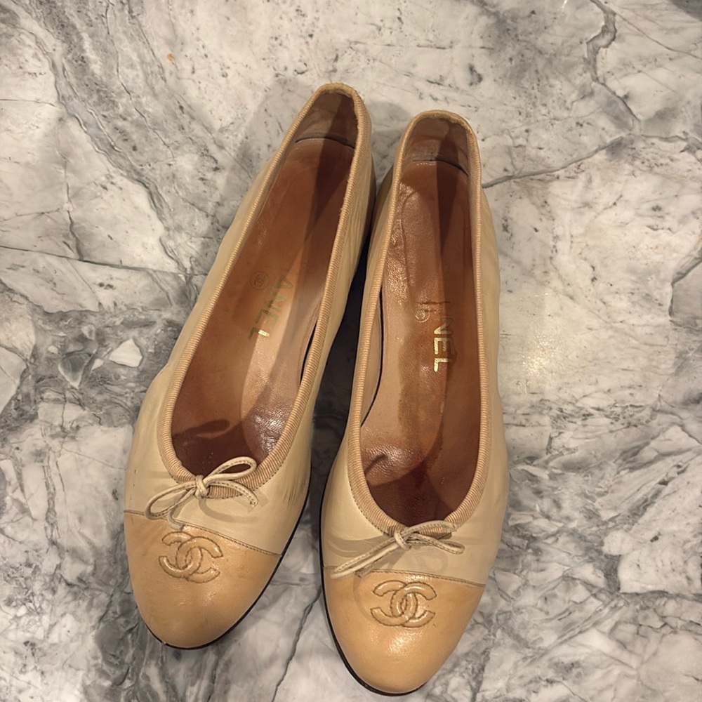 CHANEL Beige Flats with Logo Detail